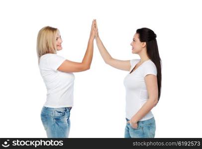friendship, diverse, body positive, gesture and people concept - group of happy different women in white t-shirts making high five