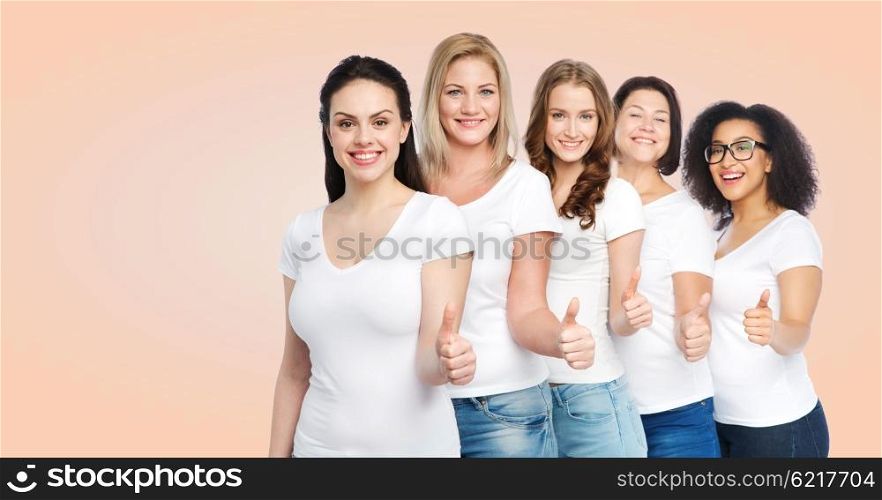 friendship, diverse, body positive, gesture and people concept - group of happy different size women in white t-shirts showing thumbs up over beige background