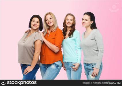 friendship, fashion, body positive, diverse and people concept - group of happy different size women in casual clothes over pink background
