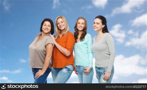 friendship, fashion, body positive, diverse and people concept - group of happy different size women in casual clothes over blue sky and clouds background