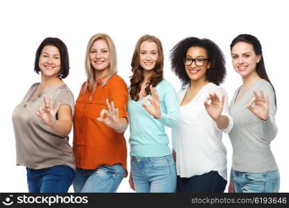 friendship, fashion, body positive, gesture and people concept - group of happy different size women in casual clothes showing ok hand sign