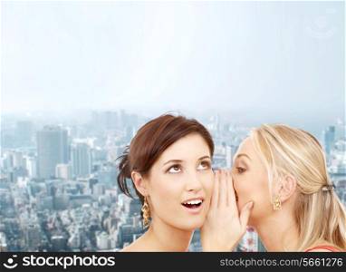 friendship, happiness and people concept - two smiling women whispering gossip