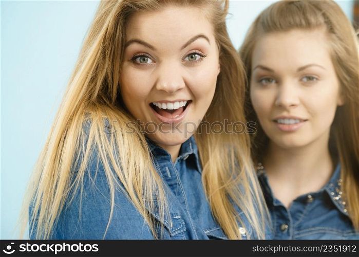 Friendship, human relations concept. Two happy women friends having fun smiling with joy. Two happy women friends having fun