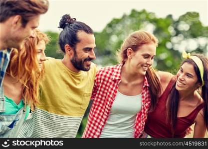 friendship, leisure, summer and people concept - group of smiling friends outdoors