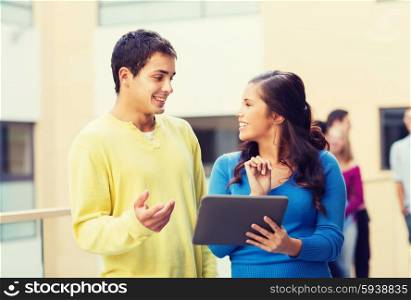friendship, people, technology and education concept - group of smiling students with tablet pc computer outdoors