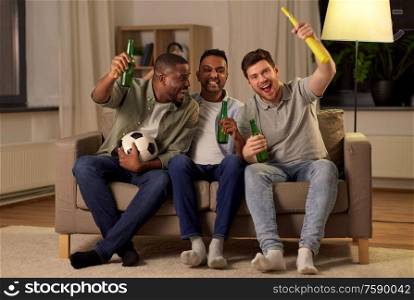 friendship, sports and entertainment concept - happy male friends with soccer ball, beer and vuvuzela supporting football team at home. friends or soccer fans with ball and beer at home