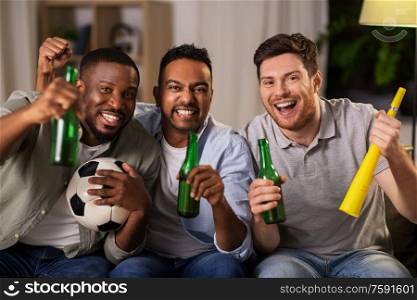 friendship, sports and entertainment concept - happy male friends with soccer ball, beer and vuvuzela supporting football team at home. friends or soccer fans with ball and beer at home