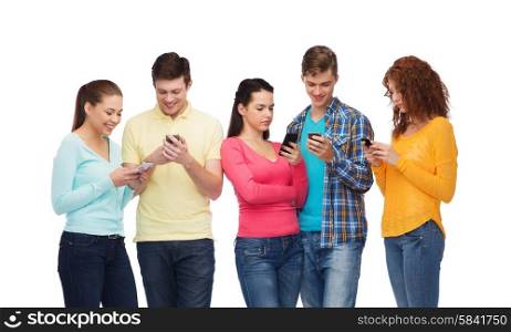 friendship, technology and people concept - group of smiling teenagers with smartphones