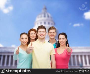 friendship, tourism, travel and people concept - group of smiling teenagers standing over white house background