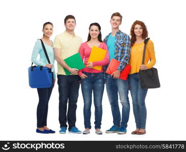 friendship, youth, education and people - group of smiling teenagers with folders and bags