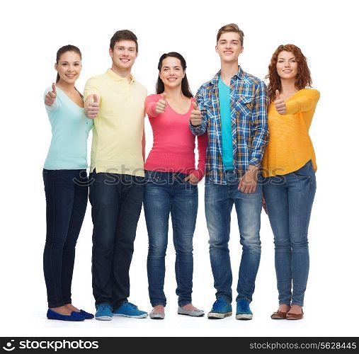 friendship, youth, gesture and people - group of smiling teenagers showing thumbs up