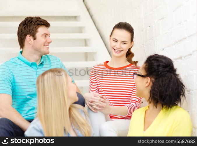 frienship and education concept - smiling teenagers hanging out