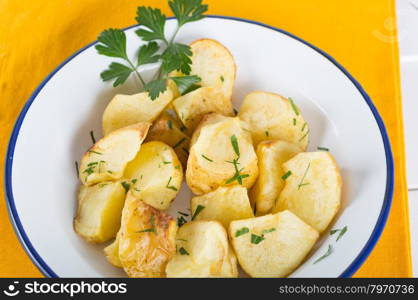 Fries seasoned with pepper and parsley and salt