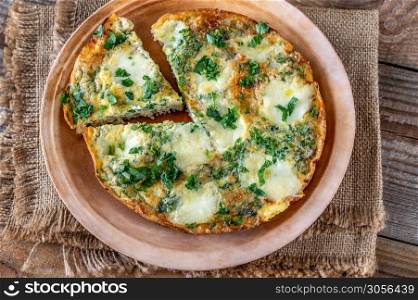 Frittata with ground meat and mozzarella on a plate