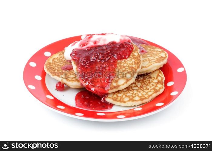 fritters with raspberry jam on a plate