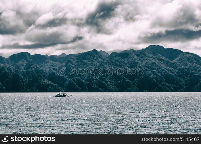 from a boat in philippines snake island near el nido palawan beautiful panorama coastline sea and rock