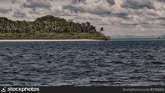 from a boat in philippines snake island near el nido palawan beautiful panorama coastline sea and rock