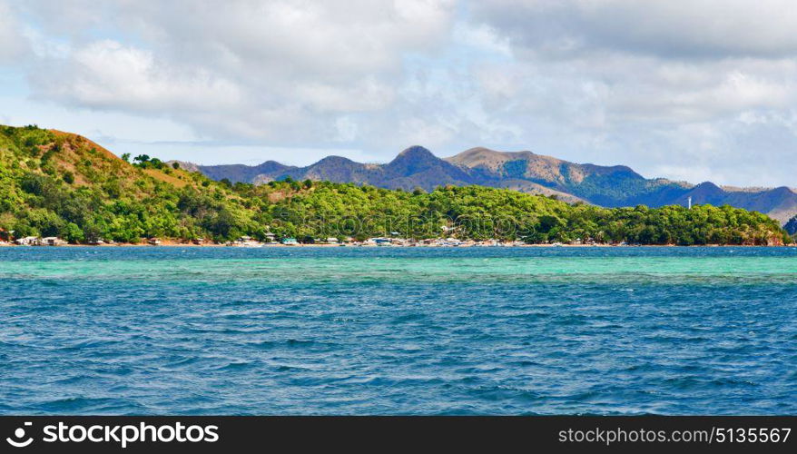 from a boat in philippines snake island near el nido palawan beautiful panorama coastline sea and rock