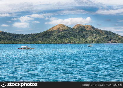 from a boat in philippines snake island near el nido palawan beautiful panorama coastline sea and rock