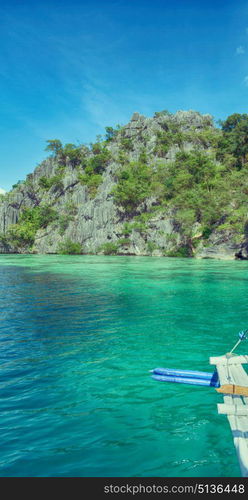 from a boat in philippines snake island near el nido palawan beautiful panorama coastline sea and rock