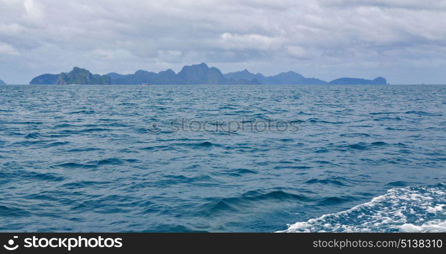 from a boat in philippines snake island near el nido palawan beautiful panorama coastline sea and rock