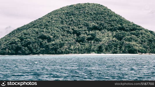 from a boat in philippines snake island near el nido palawan beautiful panorama coastline sea and rock