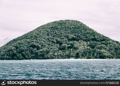 from a boat in philippines snake island near el nido palawan beautiful panorama coastline sea and rock