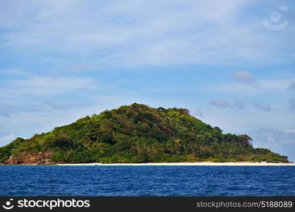 from a boat in philippines snake island near el nido palawan beautiful panorama coastline sea and rock