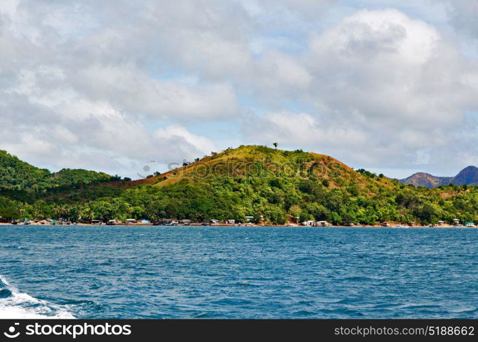 from a boat in philippines snake island near el nido palawan beautiful panorama coastline sea and rock