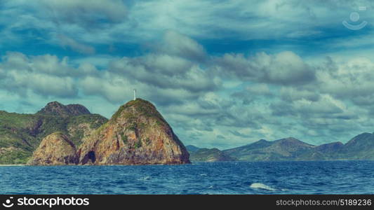 from a boat in philippines snake island near el nido palawan beautiful panorama coastline sea and rock