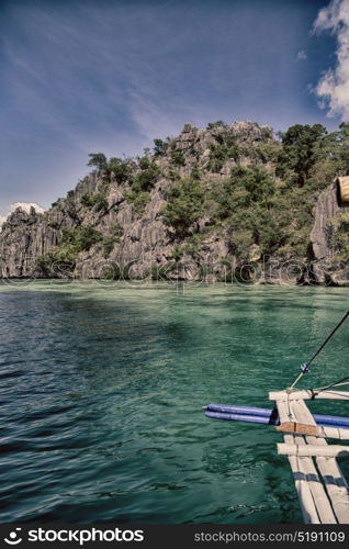 from a boat in philippines snake island near el nido palawan beautiful panorama coastline sea and rock