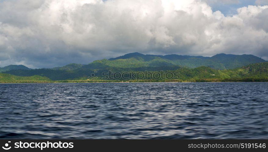 from a boat in philippines snake island near el nido palawan beautiful panorama coastline sea and rock