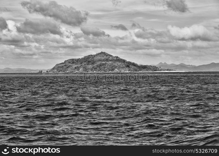 from a boat in philippines snake island near el nido palawan beautiful panorama coastline sea and rock