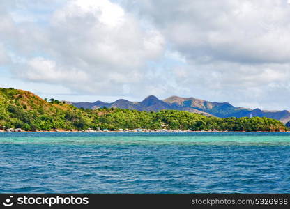 from a boat in philippines snake island near el nido palawan beautiful panorama coastline sea and rock