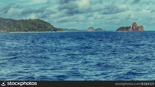 from a boat in philippines snake island near el nido palawan beautiful panorama coastline sea and rock