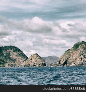 from a boat in philippines snake island near el nido palawan beautiful panorama coastline sea and rock