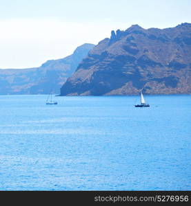 from boat in europe greece santorini island house and rocks the sky