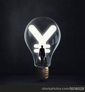 From inside of idea. Woman holding luminous idea inside light bulb