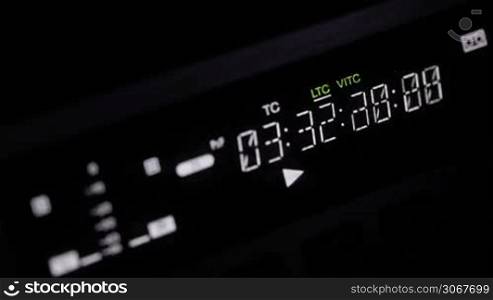 Front display of the professional video recorder. Focus pulling from timecode to sound indicators.