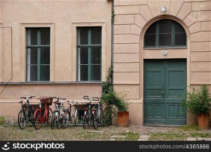 Front entrance to building with parked bicycles, Berlin
