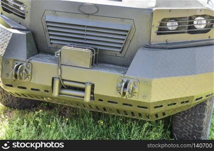 front of the military vehicle KRAZ Cougar, close up