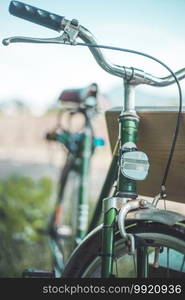 Front picture of a vintage retro bike, head reflectors and blurry background