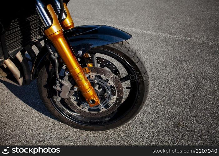 front tire orange motorbike