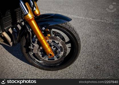 front tire orange motorbike