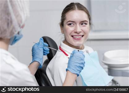front view adult female dentist