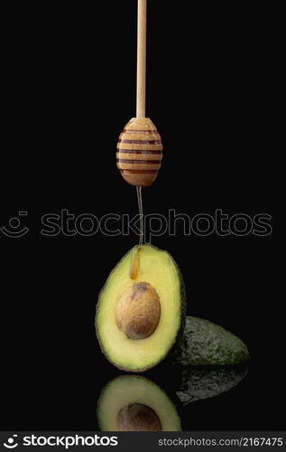 front view avocado honey dipper