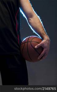 front view basketball player with ball hand