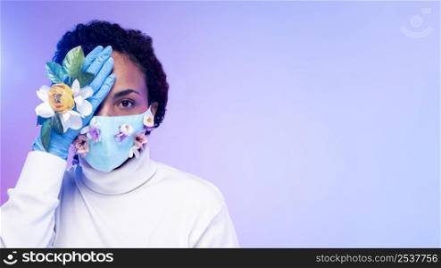 front view beautiful woman posing with floral mask gloves