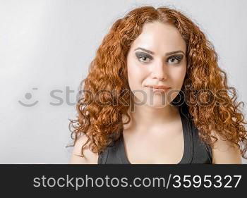 front view Beautiful woman with long curly hair head and shoulders hairdo concept