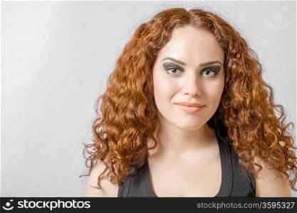 front view Beautiful woman with long curly hair head and shoulders hairdo concept